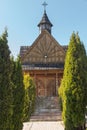 A small wooden cemetery church in Banska Wyzana in Podhale