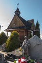 A small wooden cemetery church in Banska Wyzana in Podhale