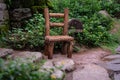 Small wooden chair, garden decoration Royalty Free Stock Photo