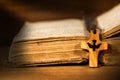Small Wooden Crucifix with Dove and Bible Royalty Free Stock Photo