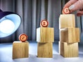 Small wooden cubes in columns, lined up in row. The concept of progressive movement in achieving the goal. Steps and Royalty Free Stock Photo