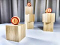 Small wooden cubes in columns, lined up in row. The concept of progressive movement in achieving the goal. Steps and Royalty Free Stock Photo