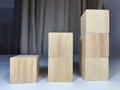 Small wooden cubes in columns, lined up in row. The concept of progressive movement in achieving the goal. Steps and Royalty Free Stock Photo