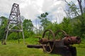 A small wooden derrick and machinery.