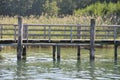Small wooden dock on Chiemsee lake,the biggest bavarian lake. Bavaria, Germany Royalty Free Stock Photo