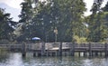 Small wooden dock on Chiemsee lake,the biggest bavarian lake. Bavaria, Germany Royalty Free Stock Photo