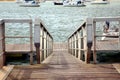 small wooden dock for fishing boats Royalty Free Stock Photo