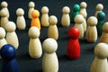 Small wooden figures. Social inclusion, diversity and equality. Royalty Free Stock Photo