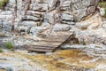 Small wooden footpath above the water flow