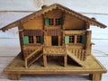 Small wooden house, handmade, with many details, front view,