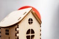 Small wooden house, Japan flag on background. Real estate concept, soft focus Royalty Free Stock Photo