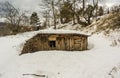 Small Wooden House in Winter Forest Royalty Free Stock Photo