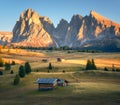 Small wooden houses in beautiful mountain valley at sunset Royalty Free Stock Photo