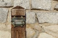 Small wooden pedestrian lamp post View along the wooden boardwalk Royalty Free Stock Photo