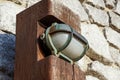 Small wooden pedestrian lamp post View along the wooden boardwalk Royalty Free Stock Photo