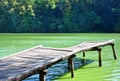 Small wooden pier near the river Royalty Free Stock Photo