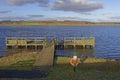 A small Wooden Pier used for leisure Boating activity in the Summer months at Monikie Park.