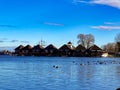 Small wooden recreation houses on pillars in water, Royalty Free Stock Photo