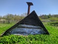 small wooden shed in the ground against the blue sky in the daytime Royalty Free Stock Photo