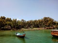 Small wooden ship on lake