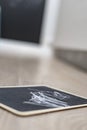 Small written blackboard on a wooden floor