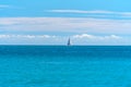 Small yacht under sail in the open sea Royalty Free Stock Photo