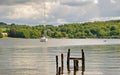 Small yacht and wooden posts on Windermere