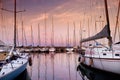 Small yachts in harbor in Desenzano del Garda on beautiful autumn sunset Royalty Free Stock Photo