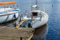 Small yachts moored at a wooden pier Royalty Free Stock Photo