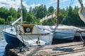 Small yachts moored at a wooden pier Royalty Free Stock Photo