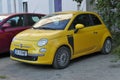 Small yellow car Fiat 500 parked Royalty Free Stock Photo