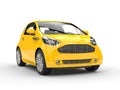 Small Yellow Compact Car - Front Headlight View