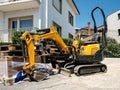 Small yellow excavator tractor rented from Kiloutou