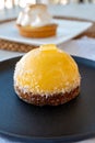 Small yellow  lemon ball tart from French pastry shop Royalty Free Stock Photo