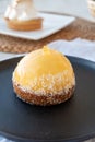 Small yellow  lemon ball tart from French pastry shop Royalty Free Stock Photo