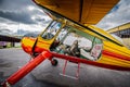 Small yellow prop plane prepared for take off Royalty Free Stock Photo