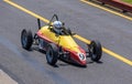 Small yellow and red vintage racing car