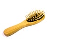 Small yellow massage comb on a white background Royalty Free Stock Photo