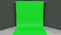 Smaller green screen setup render in a corner of a studio with grey walls.