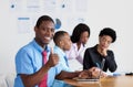 Smart african american businessman with business team at office Royalty Free Stock Photo