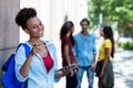 Smart african american female student working with tablet computer Royalty Free Stock Photo