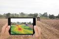 Smart agriculture concept, farmer use tablet read infrared in tr