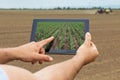 Smart agriculture. Farmer using tablet corn planting. Modern Agriculture concept. Royalty Free Stock Photo