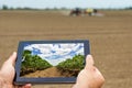 Smart agriculture. Farmer using tablet Soy planting. Modern Agriculture concept. Royalty Free Stock Photo