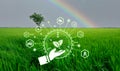 Smart agriculture with modern technology concept. Landscape of green rice farm field, rainbow, and icon of smart farming concept. Royalty Free Stock Photo