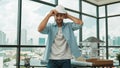 Smart architect engineer wear safety helmet while sitting on table. Tracery Royalty Free Stock Photo