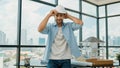 Smart architect engineer wear safety helmet while sitting on table. Tracery Royalty Free Stock Photo