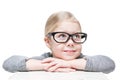 Smart beautiful little girl in glasses looking on something Royalty Free Stock Photo