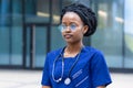 Smart black girl medical student in glasses, serious young african american woman doctor Royalty Free Stock Photo