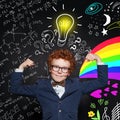 Smart boy in glasses with lightbulb on blackboard background. Brainstorming and idea concept Royalty Free Stock Photo